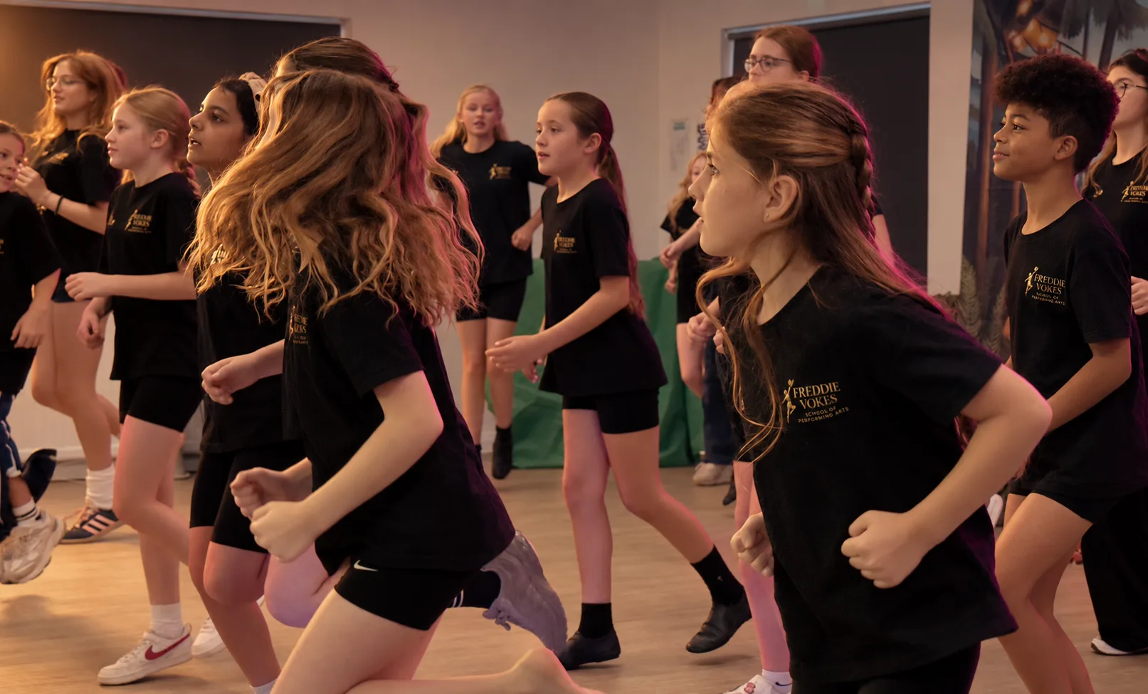 Students dancing in a performing arts class